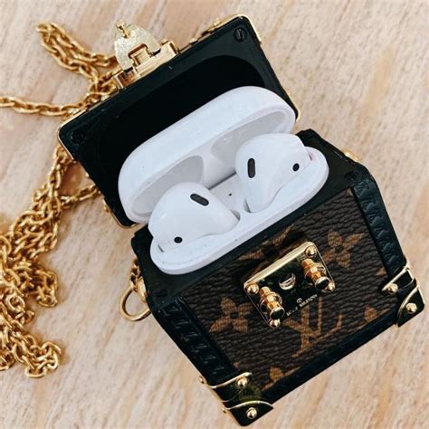 louis vuitton airpod trunk necklace|Shaped as a tiny monogrammed trunk Louis Vuitton has unveiled .